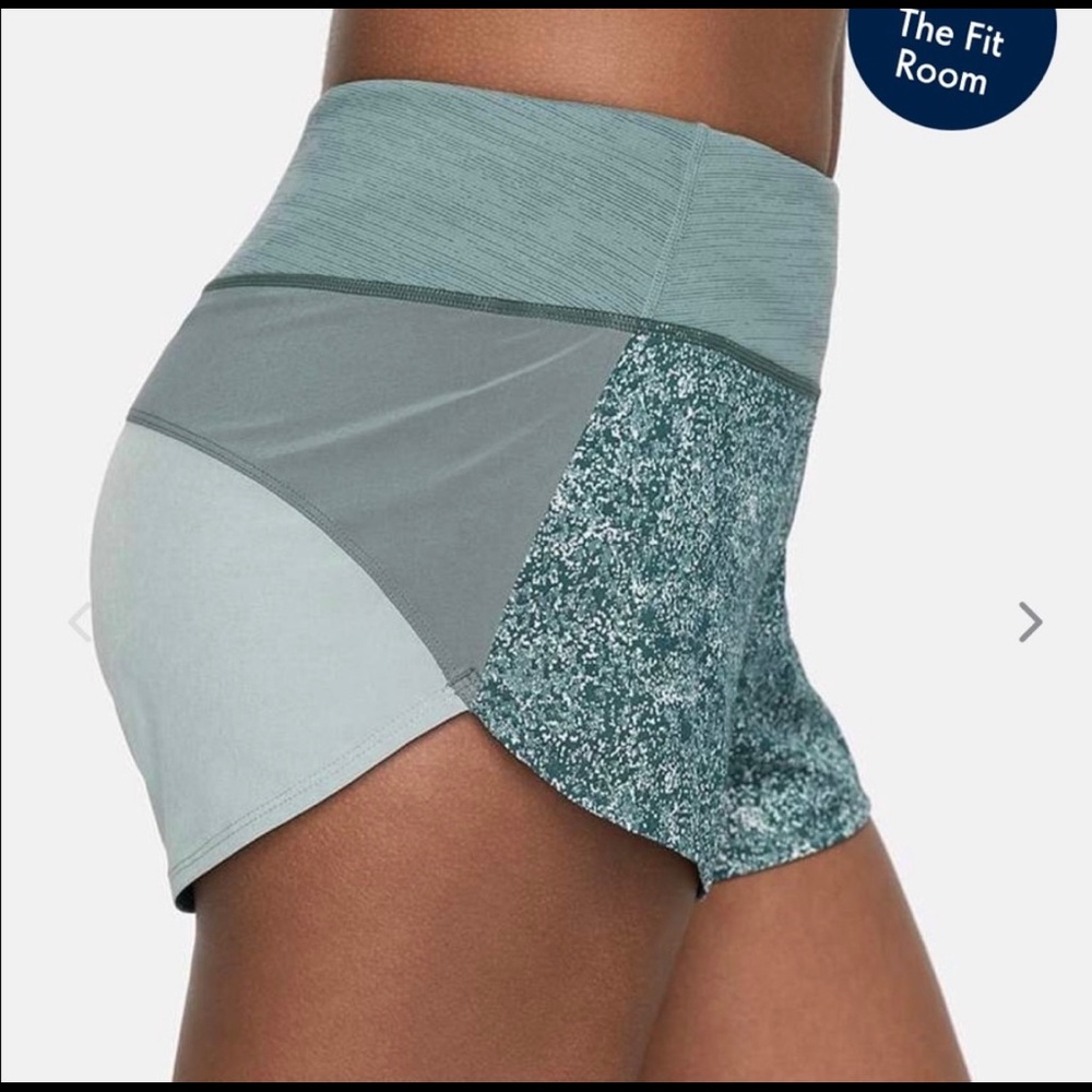 Outdoor Voices Hudson shorts in pebble green.